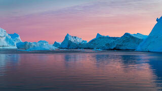 Setting sun at Disko Bay in Greenland 