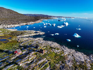 Drone image looking out to Disko bay Greenland