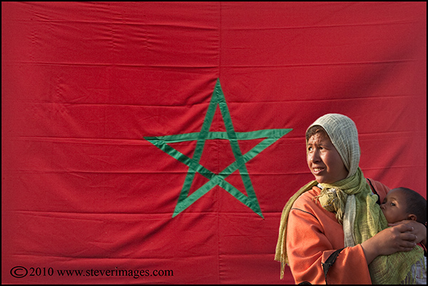 A composite image. There were numerous flags around the northern Morocco as the King was soon to visit. The&nbsp;woman and her...
